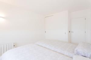 Postel nebo postele na pokoji v ubytování Maison Ses Covetes