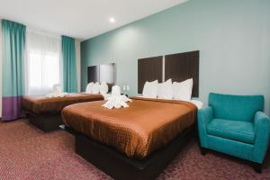 Postel nebo postele na pokoji v ubytování Express Inn - Spring