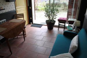 Posezení v ubytování Chambres d'hôtes L'Aubaine avec jacuzzi