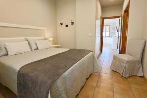 Postel nebo postele na pokoji v ubytování LE SETTE VIE HOLIDAY HOMES