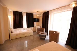 Postel nebo postele na pokoji v ubytování Hotel Korzo