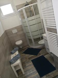 Ein Badezimmer in der Unterkunft B&B MANITO