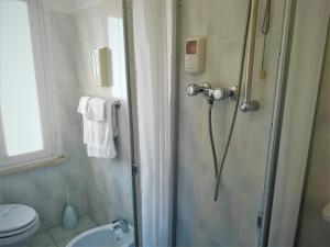 Koupelna v ubytování Albergo Moretti