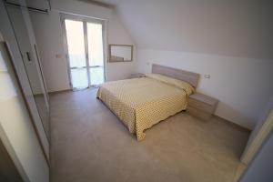 Cama o camas de una habitación en Appartamenti Elite