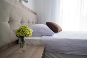 Ein Bett oder Betten in einem Zimmer der Unterkunft Apartments & Rooms Lavanda