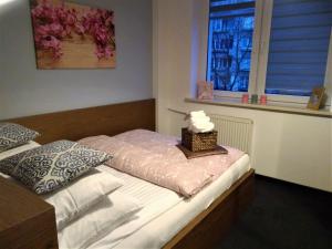 Ένα ή περισσότερα κρεβάτια σε δωμάτιο στο Stylish and spacious by Cooee Apartments