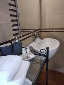 Koupelna v ubytování B&B Valleluna