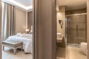 Koupelna v ubytování Hotel Genova