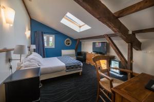 Postel nebo postele na pokoji v ubytování Hôtel Ithurria - Teritoria