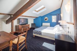 Postel nebo postele na pokoji v ubytování Hôtel Ithurria - Teritoria