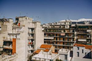 a group of tall buildings with apartments at BEST HOUSE, KAPODISTRIOU, PSILA ALONIA in Patra