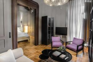 Postel nebo postele na pokoji v ubytování CoolRooms Palacio Villapanés 5 GL