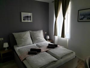 Ein Bett oder Betten in einem Zimmer der Unterkunft Hotel Garni Steinbacher Tal