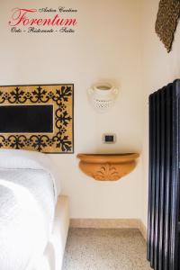 Letto o letti in una camera di Forentum Suite