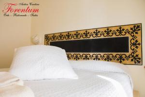 Letto o letti in una camera di Forentum Suite