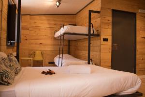 A bed or beds in a room at Hostal Erasmus by gaiarooms