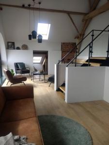 Posezení v ubytování B&B De Woestijn