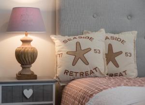 Postel nebo postele na pokoji v ubytování Landhotel Eifellust