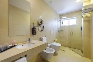 Koupelna v ubytování Hotel Regina