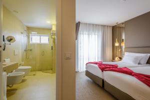 Koupelna v ubytování Hotel Regina