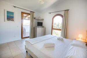 Postel nebo postele na pokoji v ubytování Cefalù In Casa + 37 fotografií