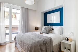 Posteľ alebo postele v izbe v ubytovaní Desirable 1BD Apartment in Kolonaki by UPSTREET