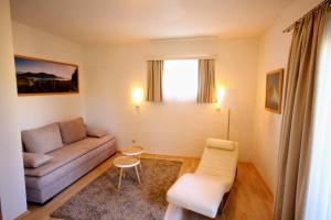 Predel za sedenje v nastanitvi Hotel Rösch
