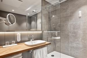 Phòng tắm tại H+ Hotel Bremen