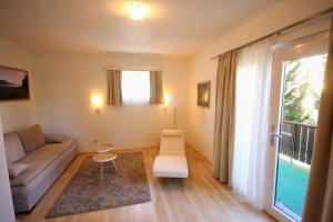 Predel za sedenje v nastanitvi Hotel Rösch
