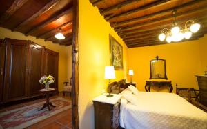 Posteľ alebo postele v izbe v ubytovaní Hotel Emblemático San Marcos