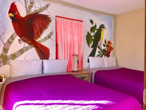 Voodi või voodid majutusasutuse Hotel JADE toas