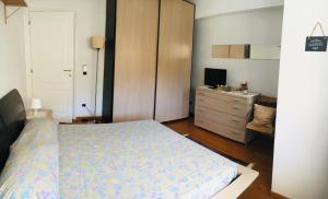 Posteľ alebo postele v izbe v ubytovaní Ledonia Apartment