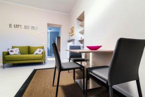 a living room with a table and two chairs at La Corte dei Balconi 2 in Como