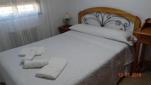 Alojamientos Guiradoにあるベッド