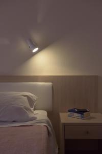 Postel nebo postele na pokoji v ubytování Alkyon Beach Hotel