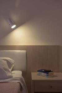 Postel nebo postele na pokoji v ubytování Alkyon Beach Hotel