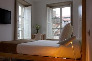 Cama o camas de una habitación en Hotel Pazo de Altamira