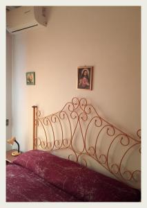 Posteľ alebo postele v izbe v ubytovaní B&B Alloggi Buonasera