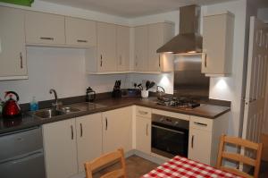 A kitchen or kitchenette at 9 Old Dalmore Gardens