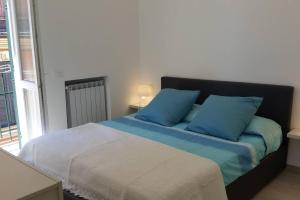 A bed or beds in a room at BLURAPALLO