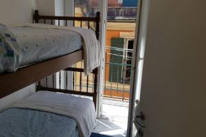 A bed or beds in a room at BLURAPALLO