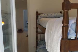 A bed or beds in a room at BLURAPALLO