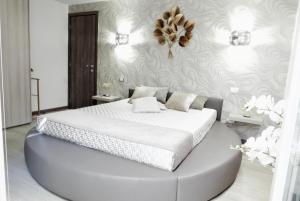 מיטה או מיטות בחדר ב-Phoenix Garda Hills