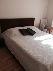 Een bed of bedden in een kamer bij Appartamento Sole