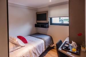 Postel nebo postele na pokoji v ubytování Hotel H9