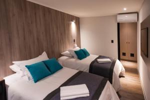 Postel nebo postele na pokoji v ubytování Hotel H9