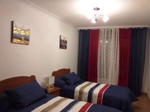 Ένα ή περισσότερα κρεβάτια σε δωμάτιο στο Pons Caesaris
