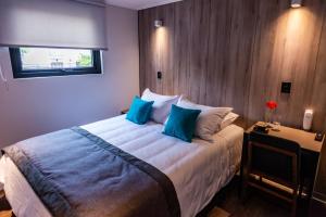 Postel nebo postele na pokoji v ubytování Hotel H9