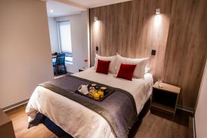 Postel nebo postele na pokoji v ubytování Hotel H9