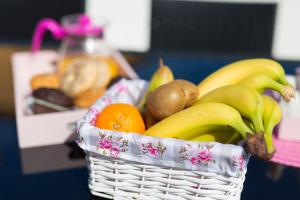 a basket of fruit sitting on a table at Apartments Braut Krk in Krk